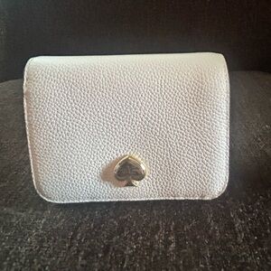NWT- Kate Spade L- Zip White wallet. In wrapper.